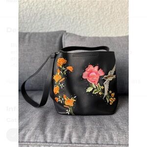 Black medium tote with orange/ pink embroidered bird bag with a touch of boho